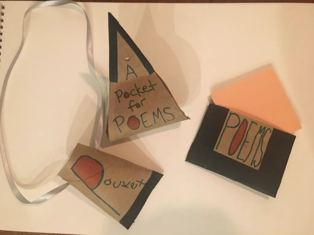 Different shapes of poem pocket envelopes made from paper with Pocket for Poems written on top.